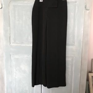 Pants Black size 4 by Teenflo. Wide leg. These pants never wrinkle